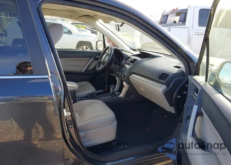 2015 Subaru Forester 2.5I Touring z USA, uszkodzony, nr VIN JF2SJAWC7FH801064